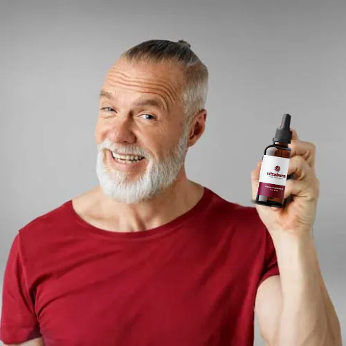 vittaburn reviews male smiling red shirt
